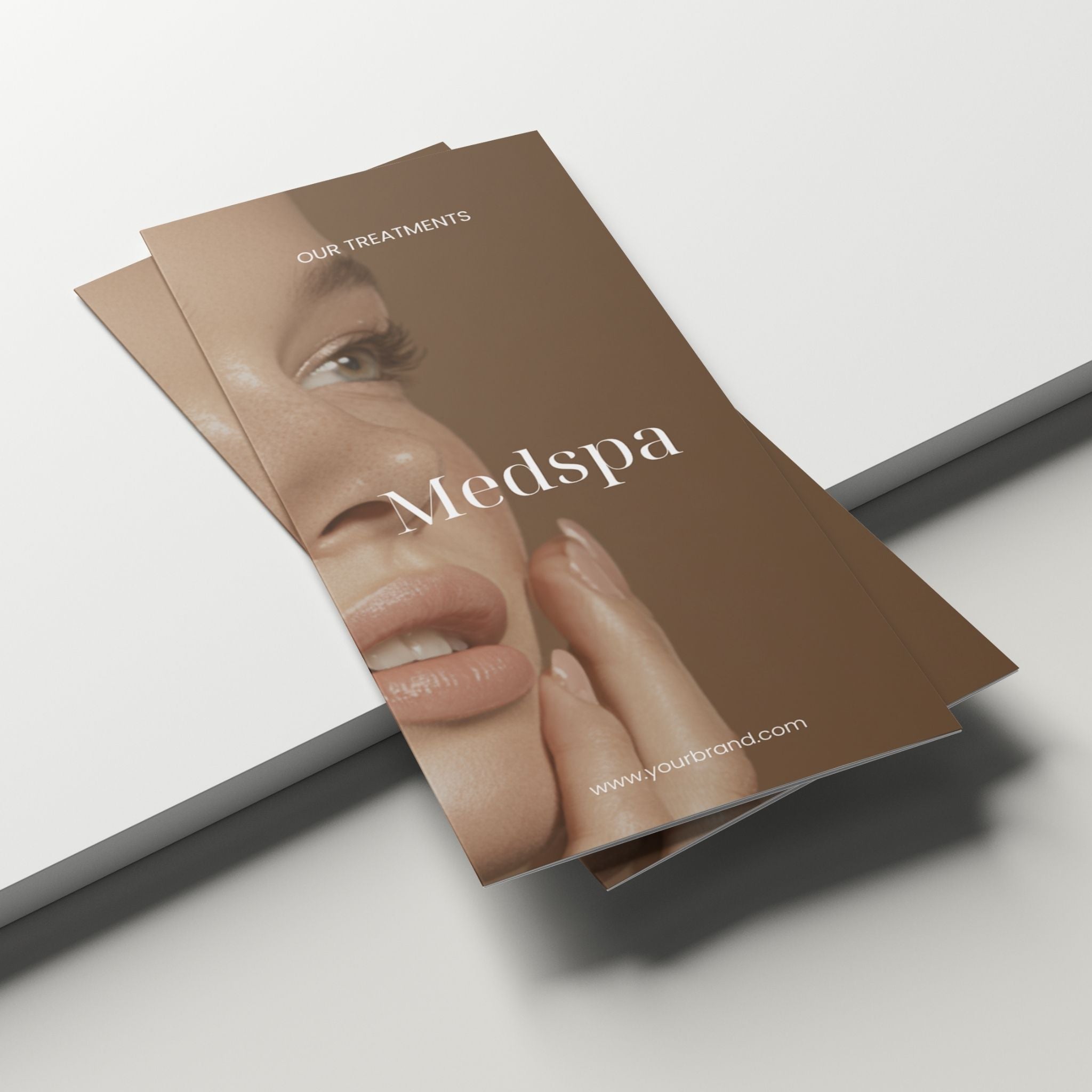 Brochure for a medspa with a close-up of a woman's face on a white background